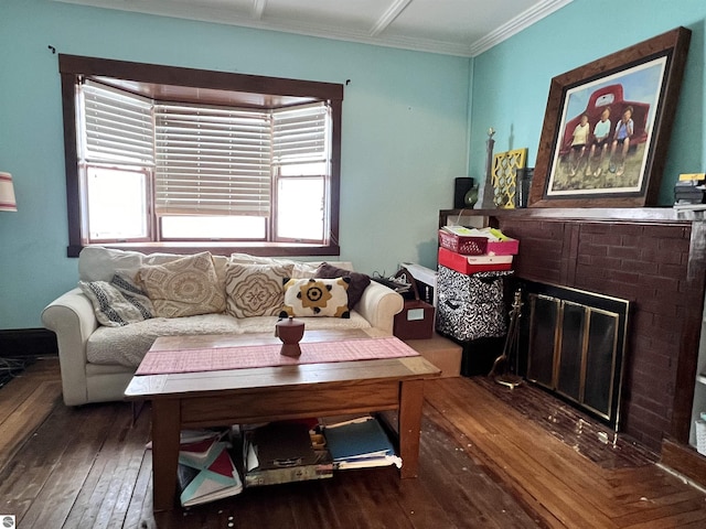 living room featuring a healthy amount of sunlight, dark hardwood / wood-style flooring, ornamental molding, and a brick fireplace