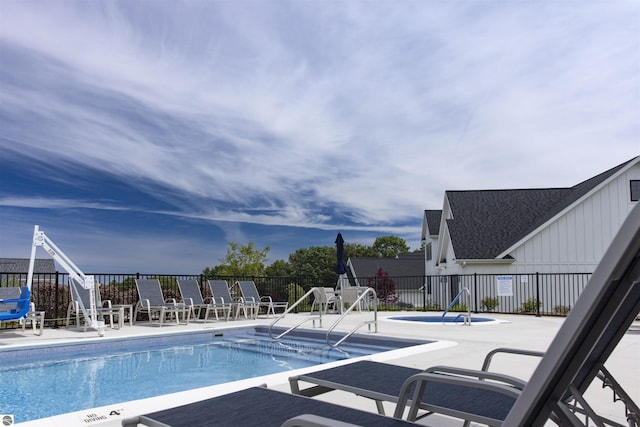 view of pool featuring a patio area