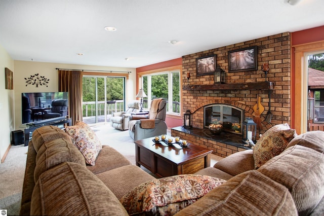 carpeted living room featuring a brick fireplace