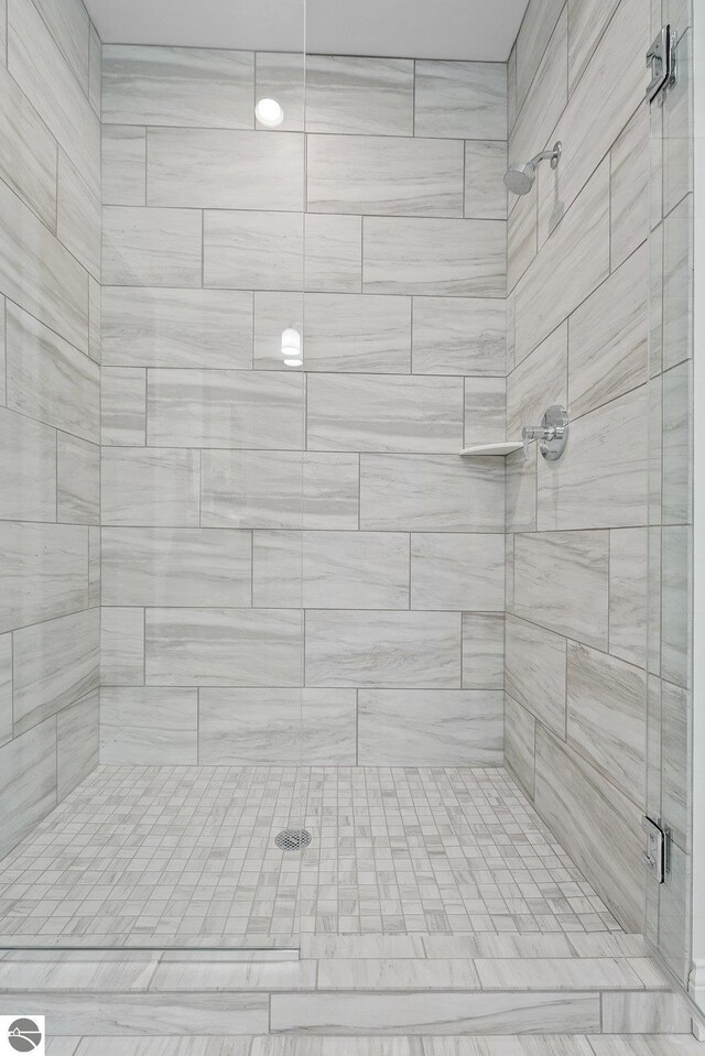 bathroom featuring walk in shower