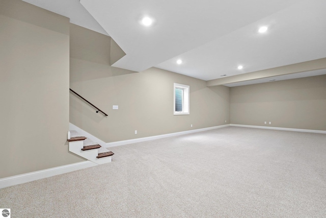 basement featuring carpet flooring