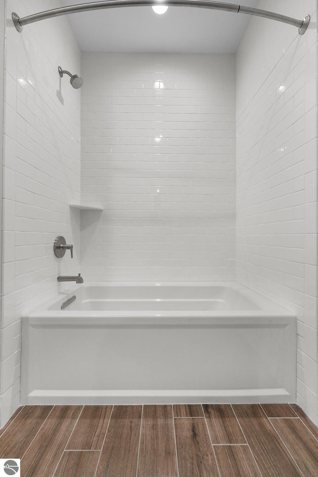 bathroom featuring bathing tub / shower combination