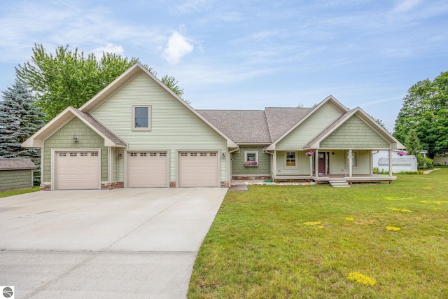 view of front of house with a garage and a front yard