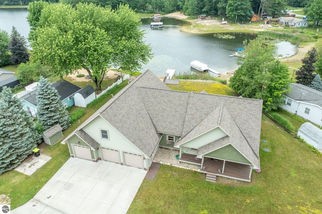 drone / aerial view with a water view