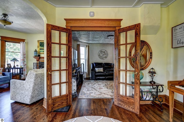 doorway to outside featuring french doors and dark hardwood / wood-style floors