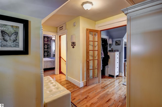 hall featuring light wood-type flooring