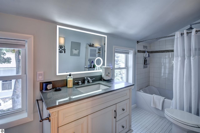 full bathroom with shower / bath combination with curtain, vanity, tile patterned floors, and a wealth of natural light