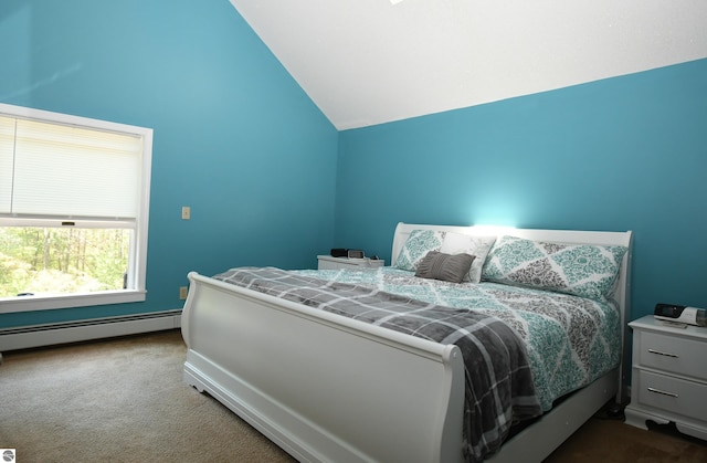 carpeted bedroom with vaulted ceiling and a baseboard heating unit