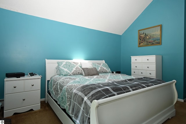 carpeted bedroom featuring vaulted ceiling