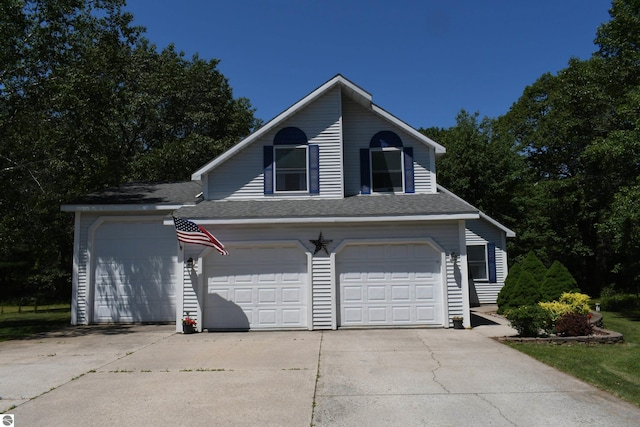 view of front of property with a garage