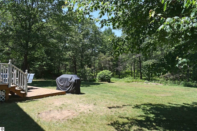 view of yard with a deck