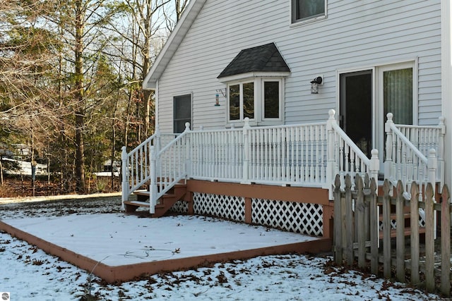 view of snow covered deck