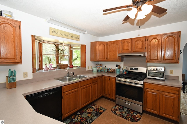 kitchen with sink, a textured ceiling, dishwasher, and stainless steel range oven