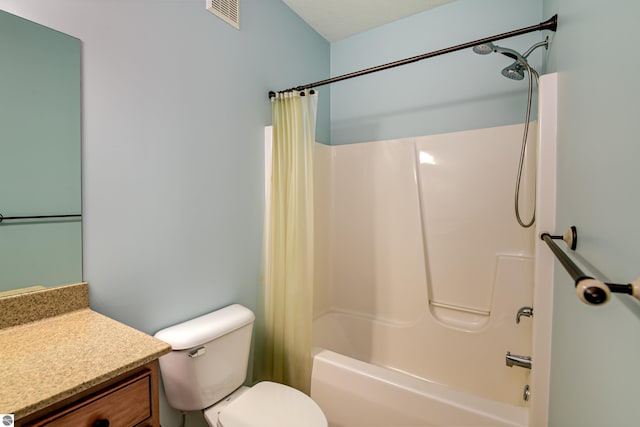 bathroom featuring vanity, shower / bath combo, toilet, and visible vents