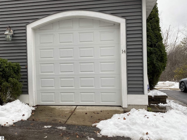 view of snow covered garage