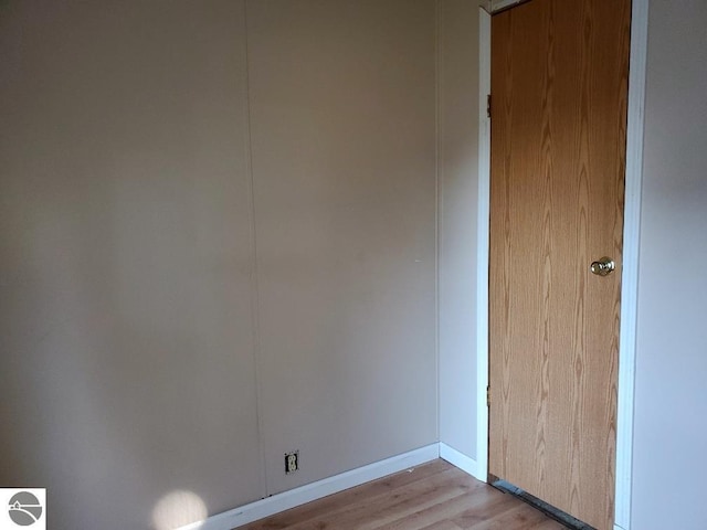 unfurnished room with light hardwood / wood-style flooring