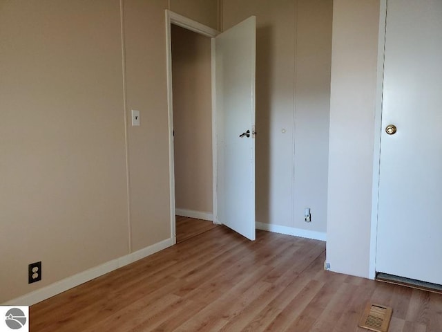 unfurnished bedroom with light hardwood / wood-style floors