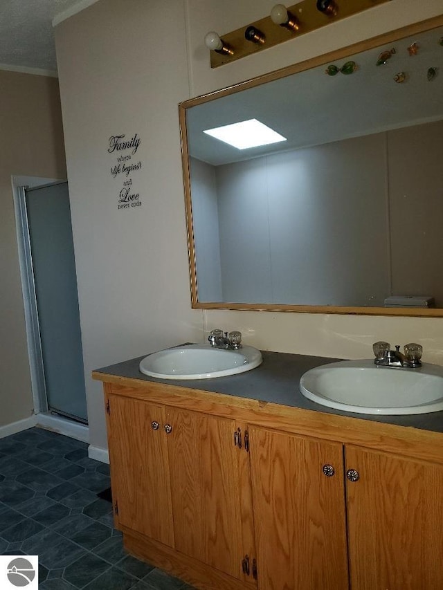 bathroom featuring vanity and walk in shower