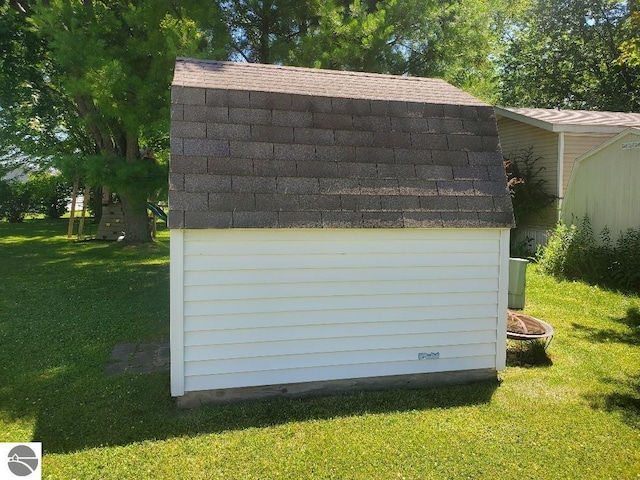 garage with a lawn