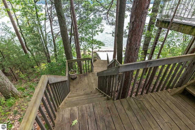 deck featuring a water view