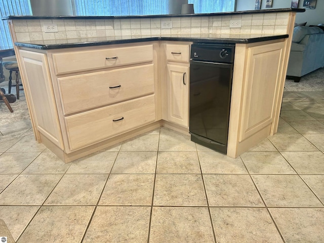 kitchen featuring backsplash and light tile patterned flooring