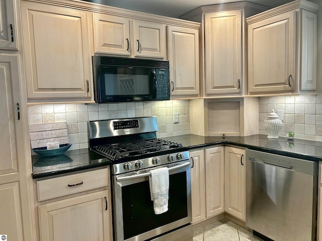 kitchen featuring decorative backsplash, stainless steel appliances, and light tile patterned flooring