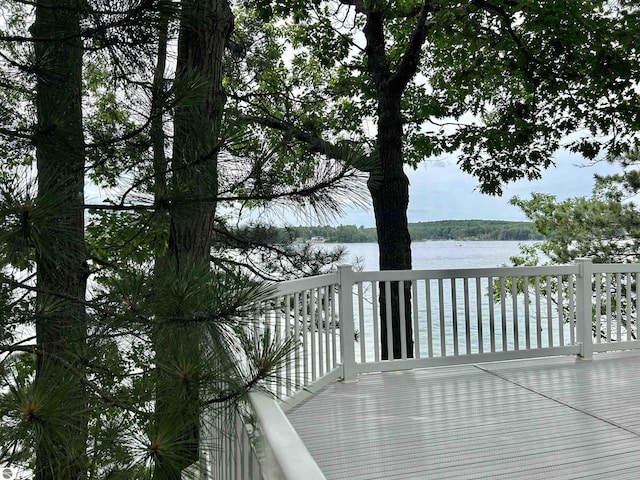 wooden terrace with a water view