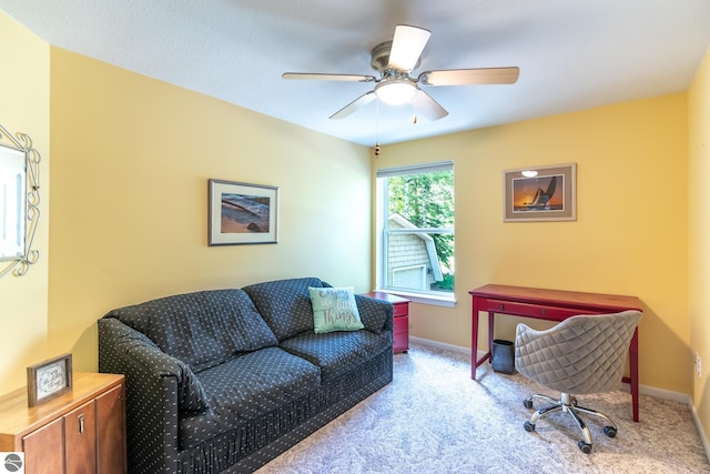 office featuring carpet floors and ceiling fan