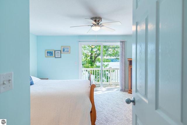 carpeted bedroom with access to exterior and ceiling fan