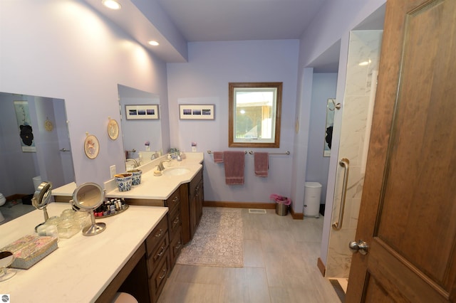 bathroom with vanity, an enclosed shower, tile patterned flooring, and toilet