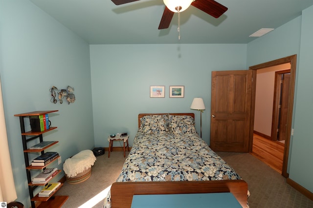 carpeted bedroom featuring ceiling fan