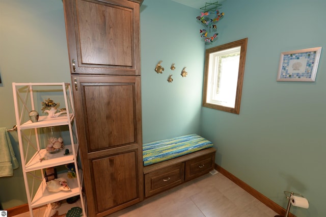 mudroom with light tile patterned floors