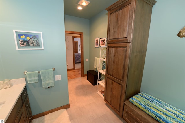 bathroom featuring vanity and tile patterned flooring