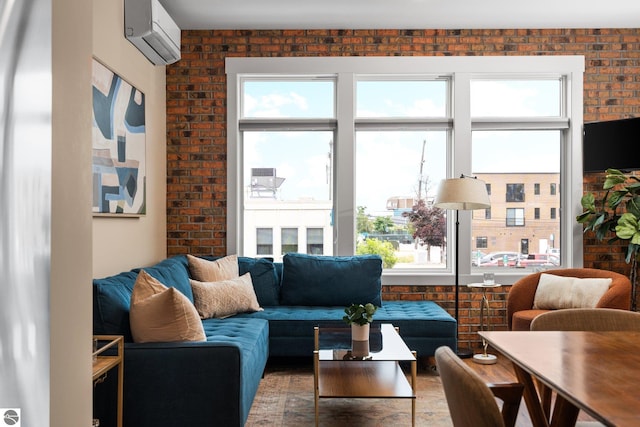 living room with a wall mounted air conditioner and brick wall