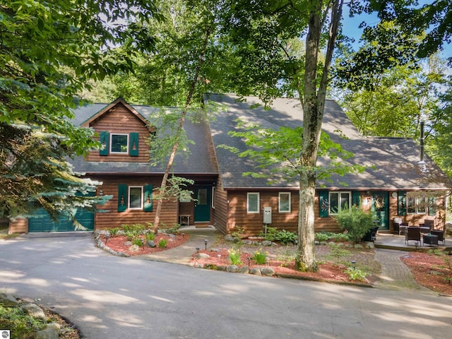 view of front of property with a garage