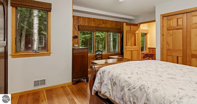 bedroom featuring a closet and light hardwood / wood-style floors