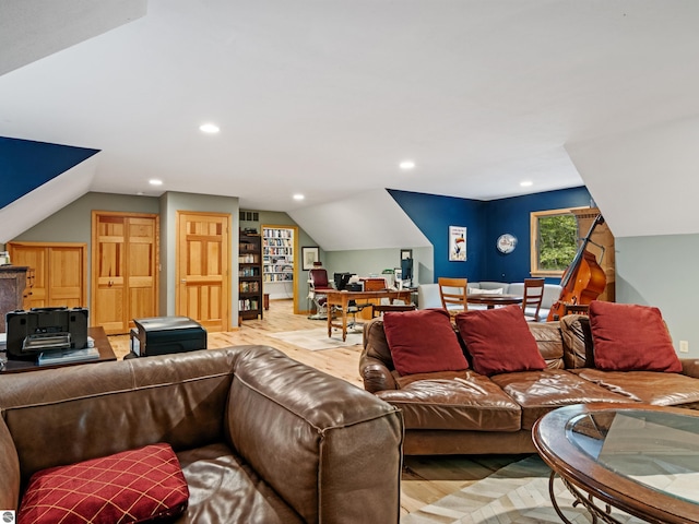 living room with lofted ceiling