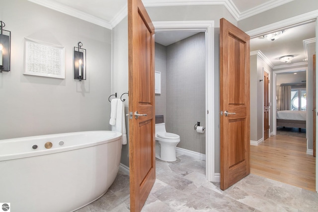 bathroom with toilet, a bath, and ornamental molding