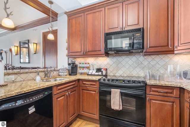 kitchen featuring backsplash, hanging light fixtures, light stone countertops, black appliances, and sink