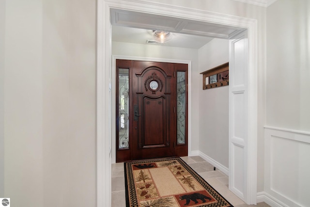 foyer featuring light tile patterned floors