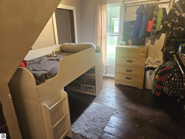 bedroom featuring dark hardwood / wood-style floors