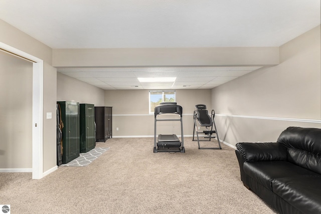 workout room with light colored carpet