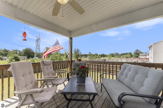 wooden deck with ceiling fan