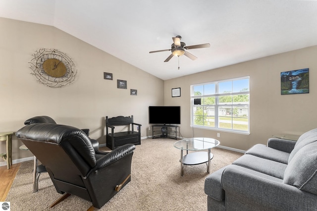 living room with ceiling fan and lofted ceiling