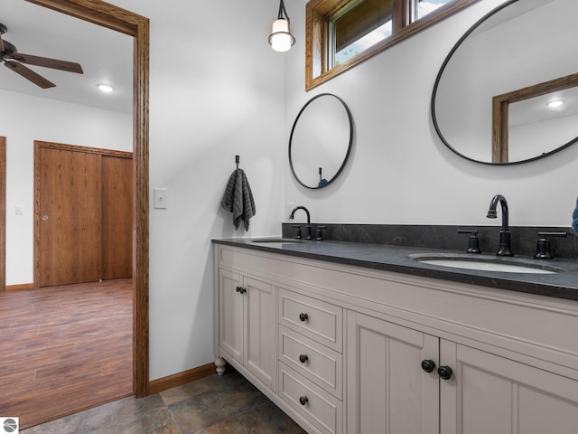 bathroom with vanity and ceiling fan