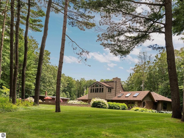 exterior space featuring a front lawn