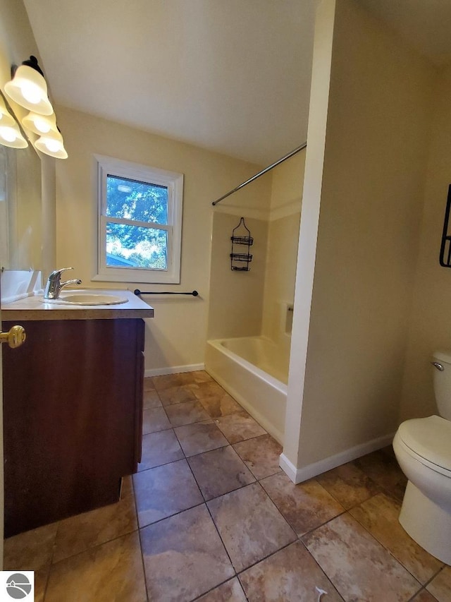 full bathroom with tile patterned flooring,  shower combination, vanity, and toilet