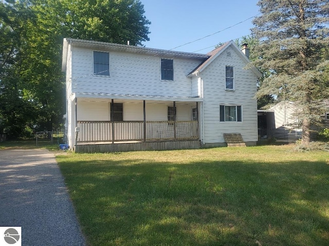 view of front of property with a front lawn and a porch