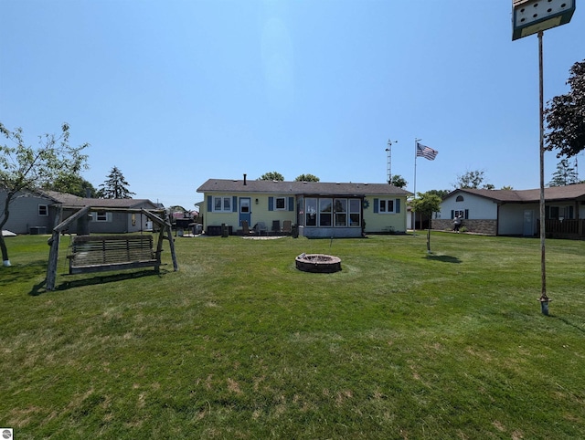 view of yard with an outdoor fire pit