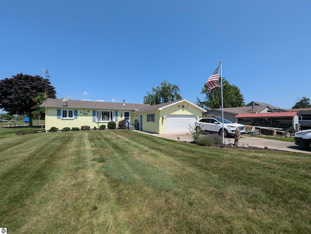 view of front facade featuring a garage and a front lawn